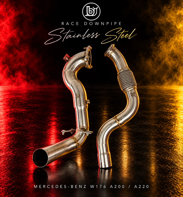 BJG W176 A200/A220 stainless-steel race downpipe, showing the two-piece assembly, braided flex joint, flanges and mounting brackets with red and yellow studio lighting.